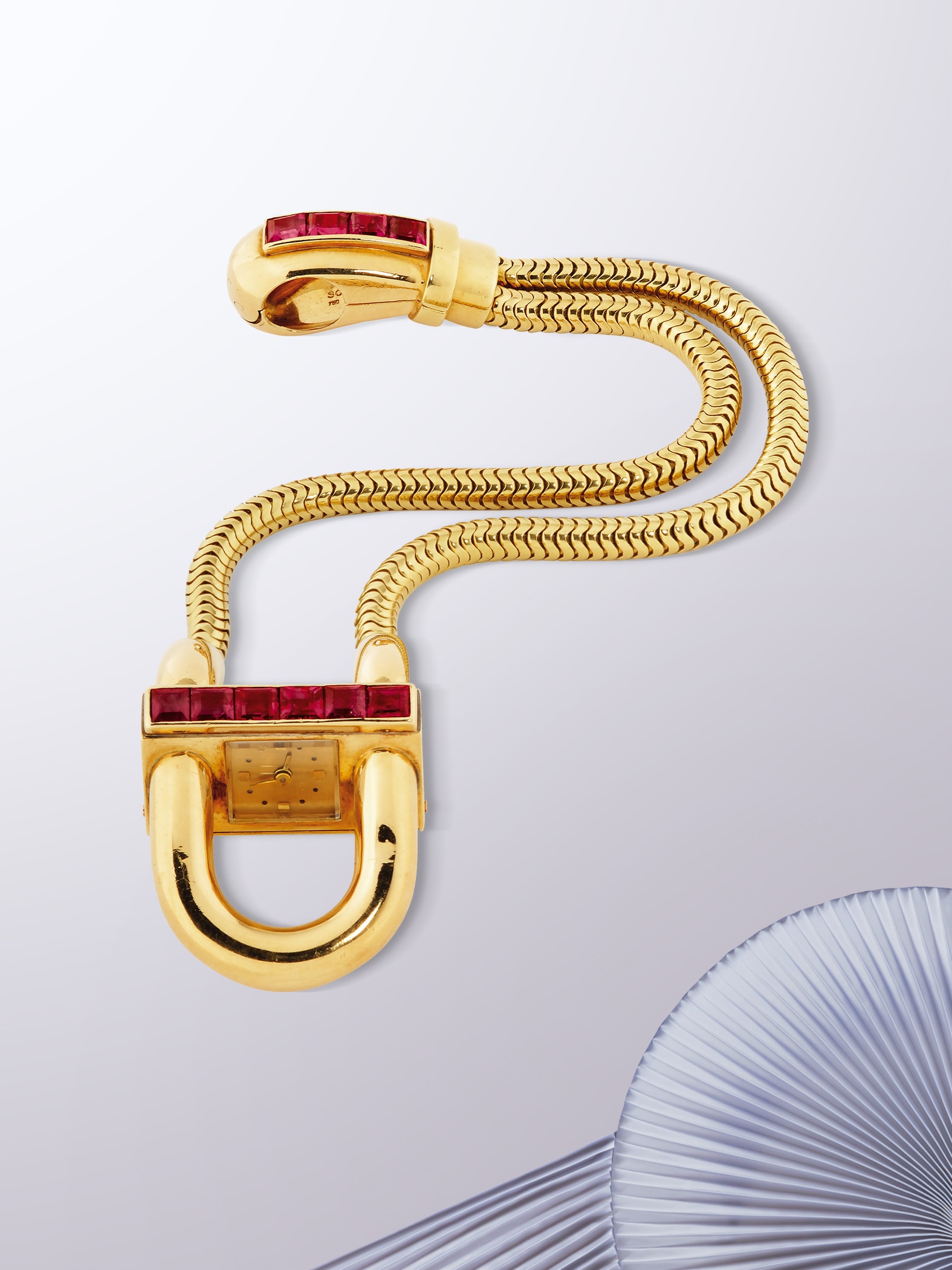 Cadenas wristwatch, 1943. Yellow gold, rubies. Van Cleef & Arpels Collection.