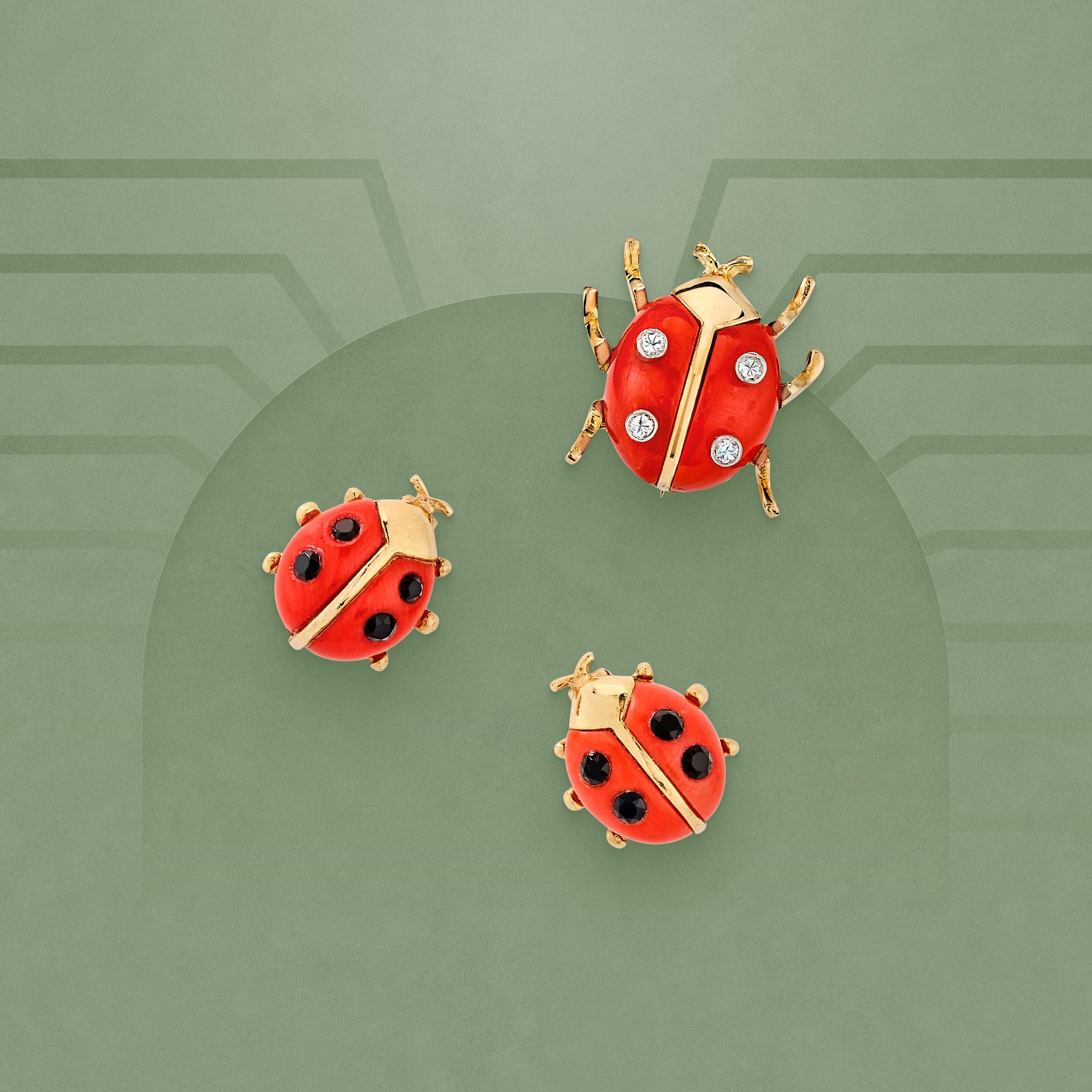 Ladybug clips, 1957 and 1973. 18K yellow gold, platinum, onyx, coral, diamonds. Van Cleef & Arpels Collection.